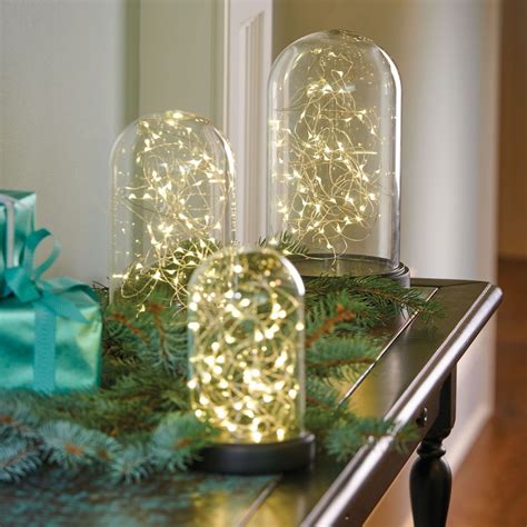 An Interesting And Sparkly Take On Christmas Lights Glass Domes Will Dazzle On A Mantel Or As A