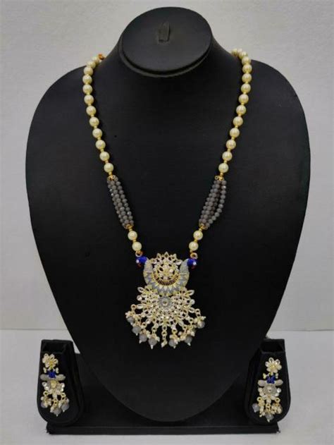 Buy Vaishnavi Imitation Gold Plated Alloy Earring Necklace Set Grey