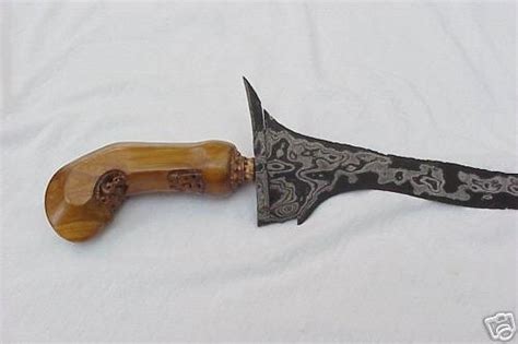 Antique Indonesian kris keris knife, curved blade | #20363657