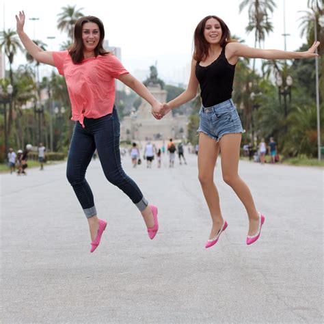 Mother And Daughter Jumping In The Park Free Image Download