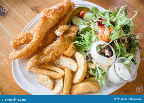 Gourmet Fish and Chips with Salad Stock Photo - Image of cuisine, meal ...