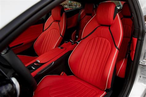 Interior of the Ferrari GTC4 Lusso inspired by the 1957 Ferrari 250 Testa Rossa painted in ...