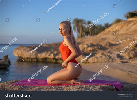 Beautiful Blonde Woman Red Swimsuit Doing Stock Photo 1623872269 Shutterstock