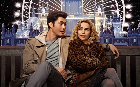 Henry Golding And Emilia Clarke Try To Keep The Holiday Spirit Alive In