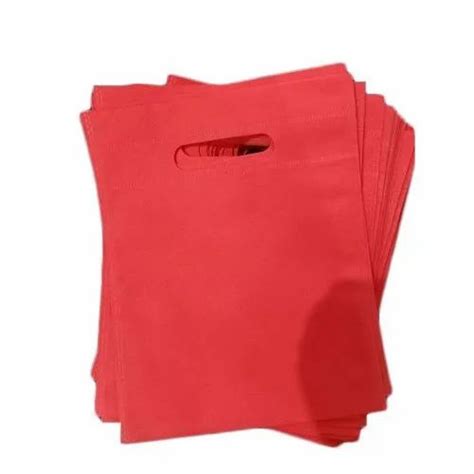 Plain Red D Cut Non Woven Bag For Shopping Capacity 2 To 5 Kg At Rs