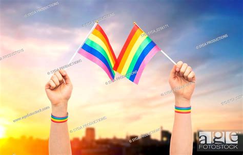 Hand With Gay Pride Rainbow Flags And Wristbands Stock Photo Picture