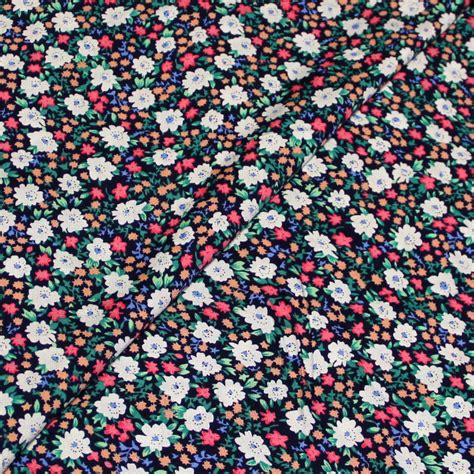 Étoffe 100 viscose Fleuri ciel sur fond marine fleuri multicolore