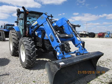 New Holland T6 150 Equipped With 875tl Loader New Tractor Ford Tractors New Holland Farm