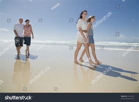 Family Walking On Beach Holding Hands Stock Photo 44176015 | Shutterstock