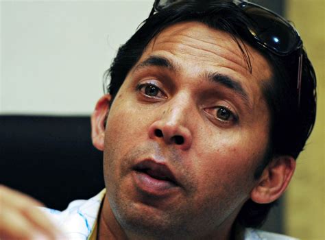 Mohammad Asif leaves a press conference in Karachi | ESPNcricinfo.com