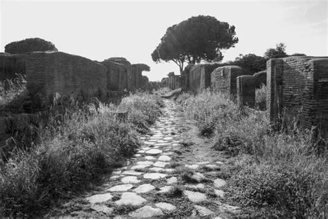 OSTIA ANTICA RUINS: MAIN AVENUE that CROSSES the ARCHEOLOGICAL SITE ...