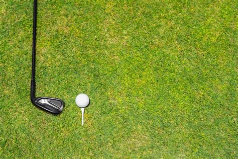 Premium Photo Top View Of Golf Club On A Green Grass On A Golf Course