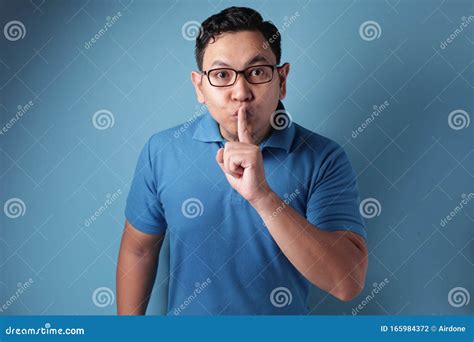 Young Man Shows Shushing Gesture Stock Photo Image Of Mouth People