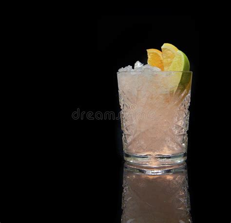 Refreshing Alcoholic Cocktail With Crushed Ice And Citrus Fruits On