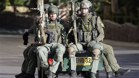 Las Vegas Swat Team Members Ride On A Vehicle At The Mgm Grand On Dec