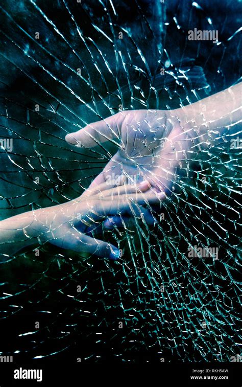 Father And Child Hands Touching Behind A Broken Glass Stock Photo Alamy