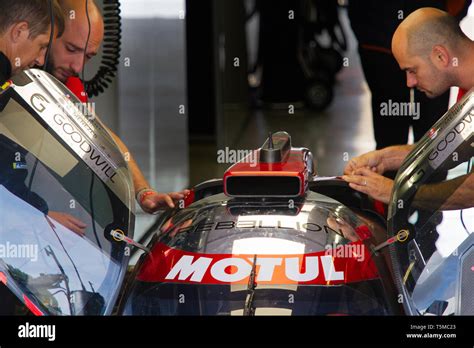 Rebellion Racing LMP1 car being prepared by pit lane mechanics for the WEC 6 Hours of ...