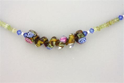 Elizabeth Hopkins Designs Petite Twisted Curved Flowered Bead