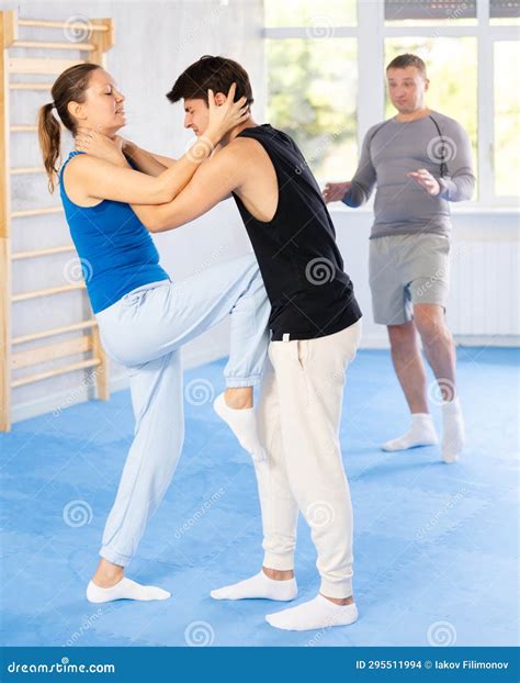 Woman Makes a Choke Hold in Self Defense Trainin Stock Photo - Image of ...