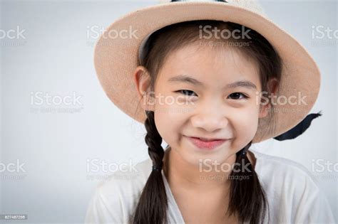 Headshot Portrait Of Happy Cute Girl Smiling Looking At Camera Stock