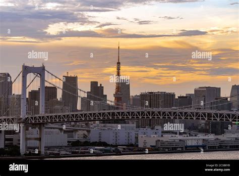 Aerial View Of Tokyo Skylines With Rainbow Bridge And Tokyo Tower Over