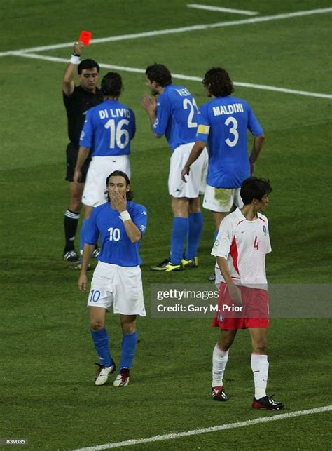 Referee Byron Moreno of Ecuador shows the red card to Francesco Totti... News Photo - Getty Images