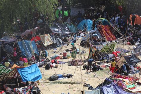 EXCLUSIVE: Photo Tour of Migrant Detention Camp Under Texas Border Bridge