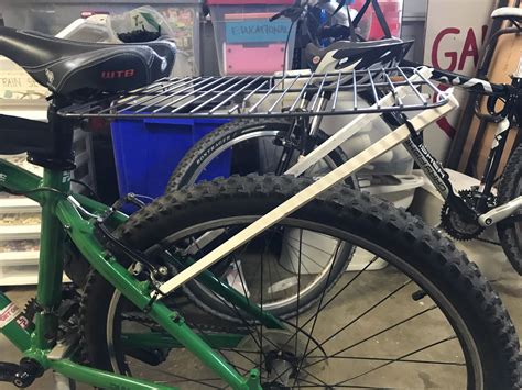 Attach a bakers drying rack to back of seat and make two wooden posts ...