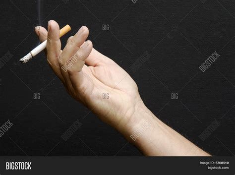 Male Hand Holding Smoking Cigarette Image And Photo Bigstock