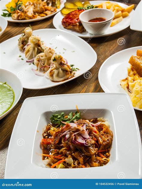 Dishes with different food stock photo. Image of diversity - 104532456