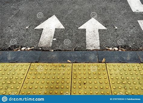 Two Arrow Signs As Road Markings On A Street Stock Photo Image Of