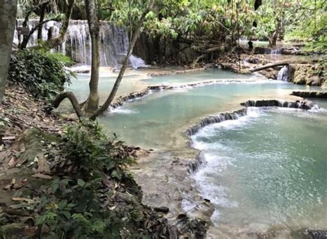 Kuang Si Falls Is The Epitome Of Waterfall Heaven