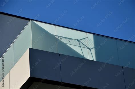 Railing Of A Luxury House Consisting Of Glass Panels Fastened With Gray