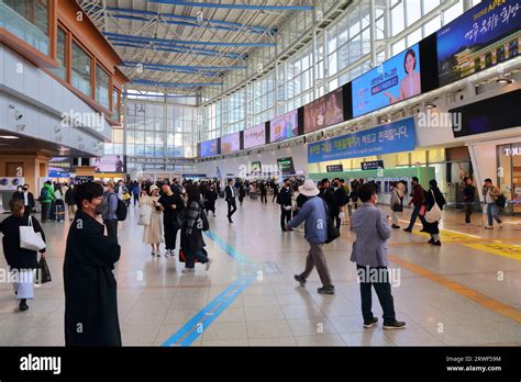 SEOUL, SOUTH KOREA - MARCH 26, 2023: Passengers visit Seoul Station ...