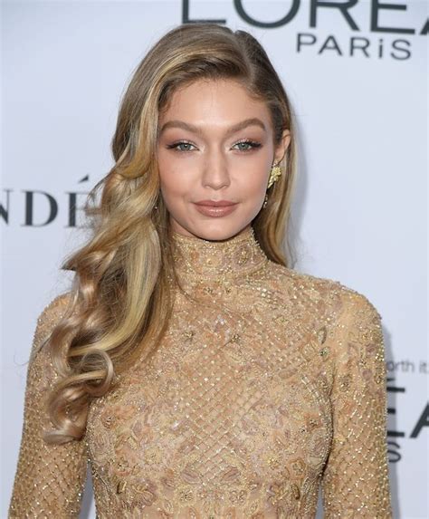 Photos Gigi Hadid Stuns On Red Carpet In Sheer Gold Lace Dress The