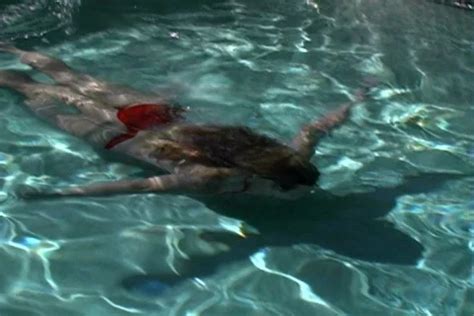 Sexy Bikini Clad Blonde In A Swimming P Stock Video Pond