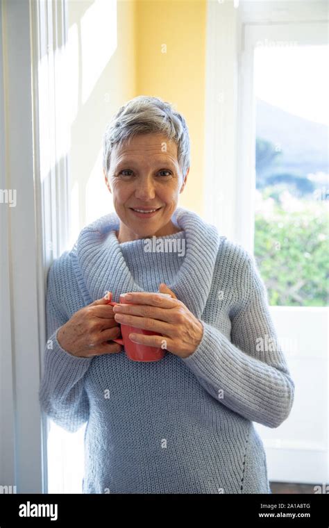 Mature Woman Alone At Home Stock Photo Alamy