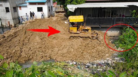 Next Level Construction Electricity Pillar Stand By Bulldozer Push