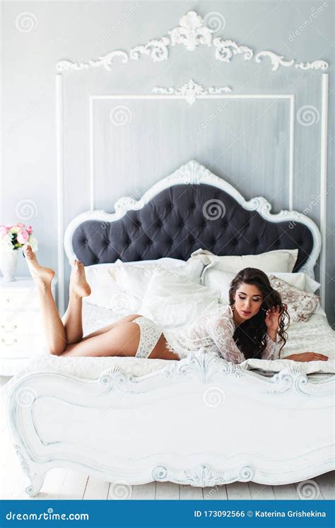 Woman Posing On Bed In White Lingerie Stock Photo Image Of Makeup