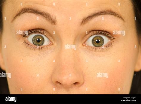 woman with eyes wide open in surprise or shock Stock Photo: 5107379 - Alamy