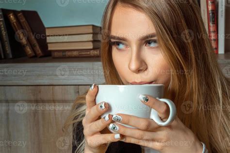 Blonde Drinks A Tea 16497961 Stock Photo At Vecteezy