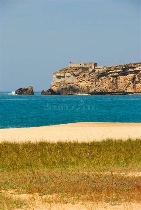 Cliff and Beach, Nazare, Portugal Stock Image - Image of tropical ...