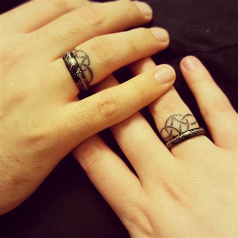 Make a Rocking Couple by Astonishing Ring Tattoos