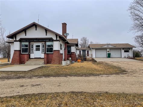 Circa 1920 Farmhouse For Sale W/Garages And Outbuilding on 32 Acres