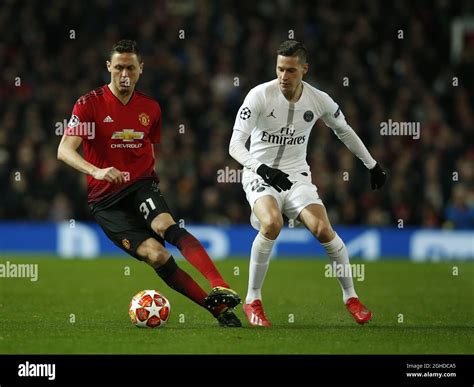 Nemanja Matic Of Manchester United Turns Away From Julian Draxler Of