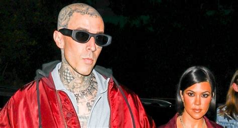 Kourtney Kardashian Travis Barker Hold Hands While Heading To His Son