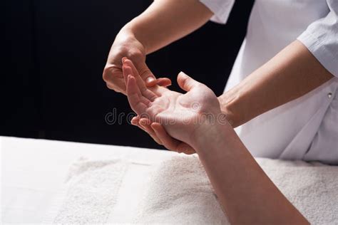 Masseur Doing Hand Massage With Oil In Spa Salon Spa Procedures Body