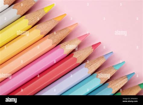 Colored Pencils Of Pastel Colors On A Pink Background Multi Colored