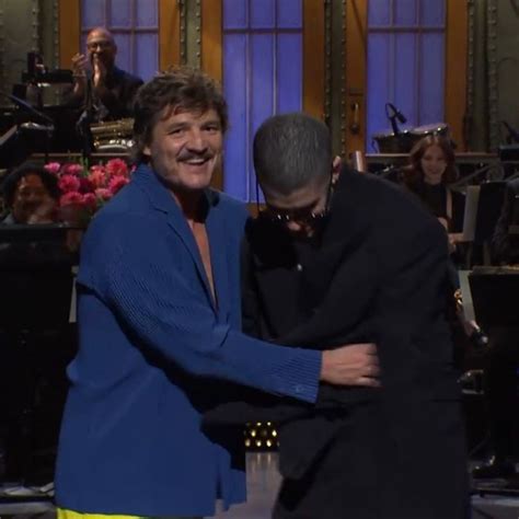 two men hugging each other on the tonight show