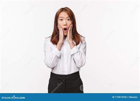 Portrait Of Shocked And Concerned Asian Woman Staring With Disbelief